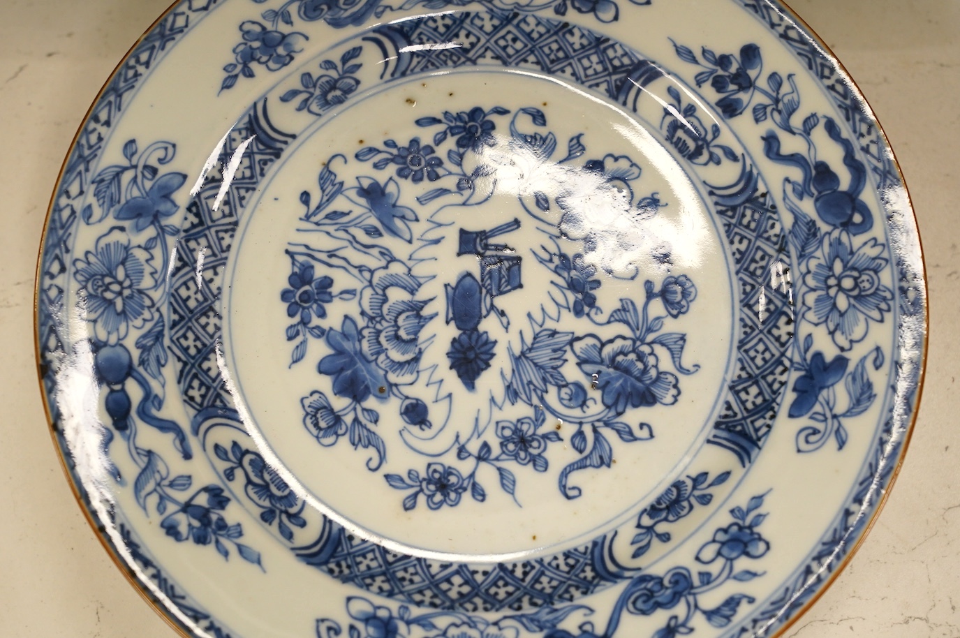 Ten 18th century Chinese export blue and white porcelain plates, each 23cm diameter. Condition - fair, some minor chipping